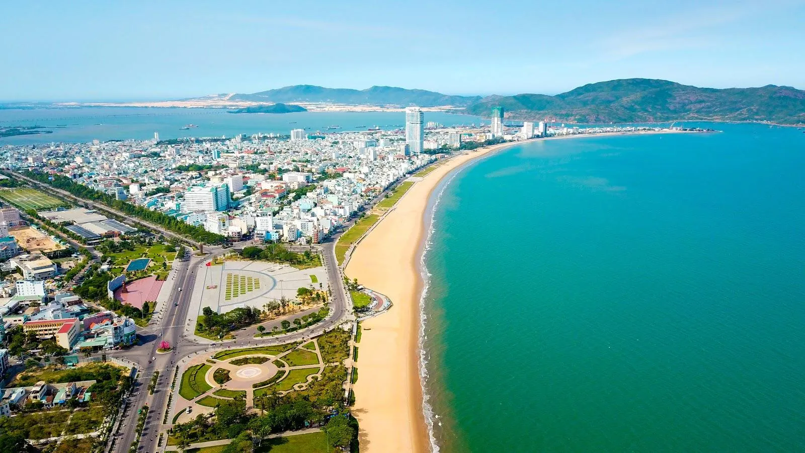 Quy Nhon city and its long sandy beach from the air